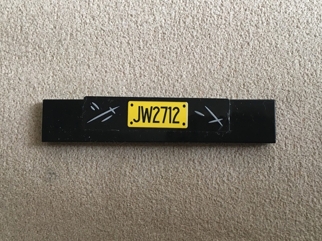Lego Tile 1 x 6 with Yellow 'JW2712' Pattern (Sticker) - Set 75926 / Black