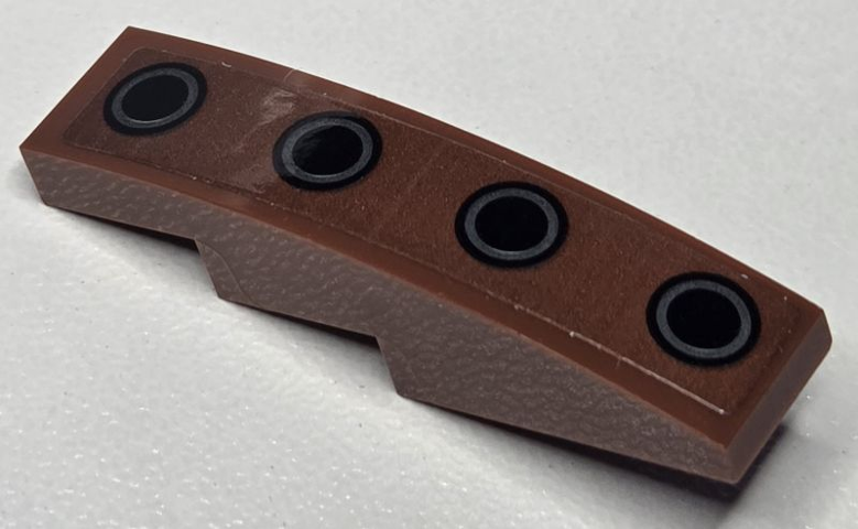 Lego Slope, Curved 4 x 1 with Dark Bluish Gray Rings on Black Circles Pattern (Sticker) - Set 75381 / Reddish Brown