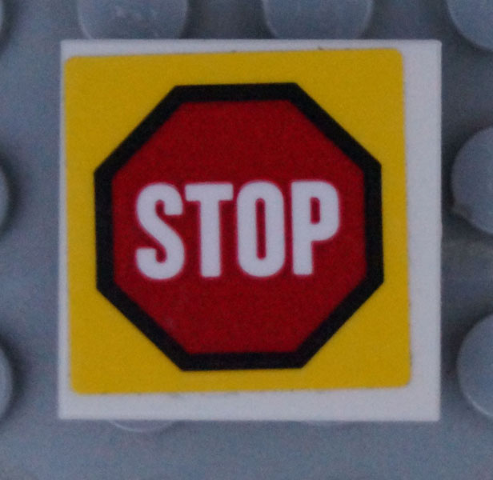 Lego Tile, Modified 2 x 2 Inverted with Road Sign 'STOP' in Octagon Pattern (Sticker) - Set 60169