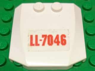 Lego Wedge 4 x 4 x 2/3 Triple Curved with Red 'LL-7046' on Transparent Background Pattern (Sticker) - Set 7046 / White