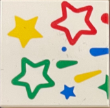 Lego Tile 2 x 2 with Green, Red, Yellow and Blue Stars Pattern