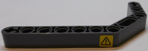 Lego Technic, Liftarm, Modified Bent Thick 1 x 11.5 Double with Black Exclamation Mark on Yellow Background Pattern Model Left Side (Sticker) - Set 42055 / Dark Bluish Gray
