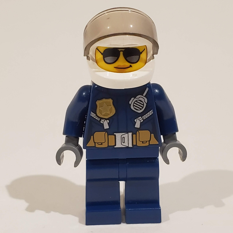 Lego Policewoman, Dark Blue Jacket with Radio, Badge, and Belt with Pouches, White Helmet with Trans-Brown Visor, Sunglasses