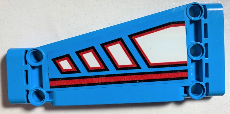 Lego Technic, Panel Plate 5 x 11 x 1 Tapered with Red Line and White Polygons Outlined in Red Pattern Model Left Side (Sticker) - Set 42070 / Dark Azure