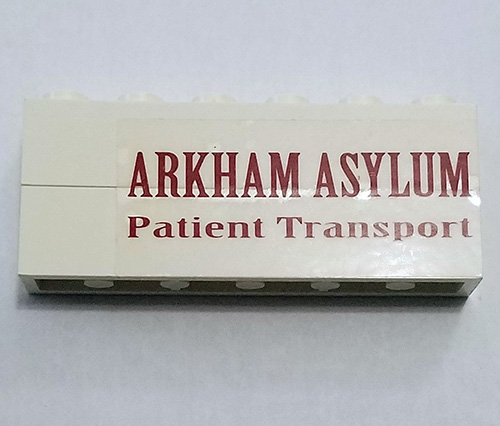 Lego Stickered Assembly 6 x 1 x 2 with 'ARKHAM ASYLUM Patient Transport' Pattern Model Left Side (Sticker) - Set 7785