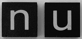 Lego Modulex, Tile 2 x 2 (no Internal Supports) with White Lowercase Letter n / u Pattern / Modulex Black