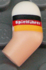 Lego Arm, Left with Molded White Short Sleeve and Printed German Flag with 'Spielführer' Pattern / Light Nougat