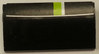Lego Slope, Curved 2 x 4 x 2/3 without Bottom Tubes with Lime and White Stripe on Black Background Pattern Model Front (Sticker) - Set 8154