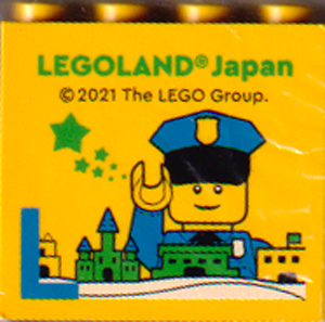 Lego Brick 2 x 4 x 3 with LEGOLAND Japan, Policeman Minifigure (Mr. Cop), Skyline, and Blue Capital Letter L Pattern
