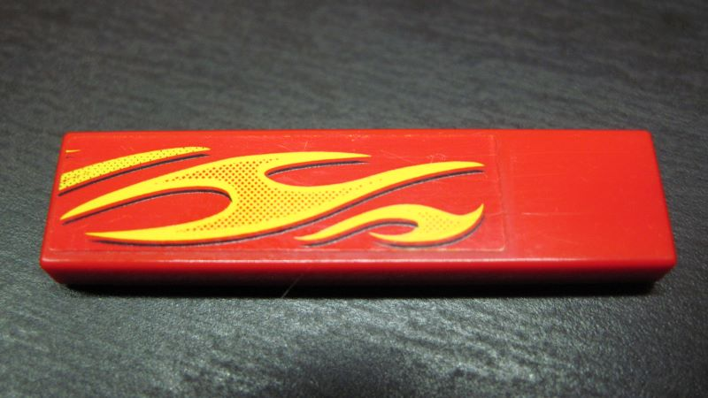 Lego Tile 1 x 4 with Yellow Flames Pattern Model Front Right Side (Sticker) - Set 8667