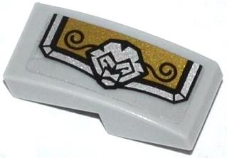 Lego Slope, Curved 2 x 1 x 2/3 with Gold and Silver Armor Plate with Lion Head and Black Swirls Pattern Model Right Side (Sticker) - Set 70123