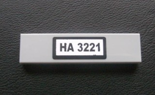 Lego Tile 1 x 4 with Black 'HA 3221' Pattern on White Background (Sticker) - Set 3221 / Light Bluish Gray