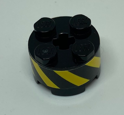 Lego Brick, Round 2 x 2 with Axle Hole with Black and Yellow Danger Stripes Pattern (Sticker) - Set 70610