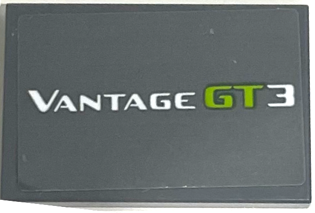 Lego Tile 2 x 3 with White and Lime 'VANTAGE GT3' Pattern (Sticker) - Set 76910 / Dark Bluish Gray