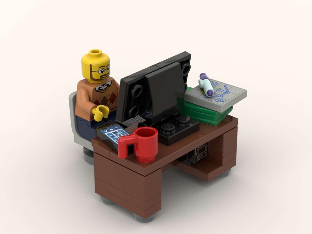 Lego Teacher with a cluttered desk