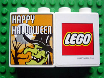 Lego Duplo, Brick 1 x 2 x 2 with Halloween 2006 Happy Halloween and Witch Pattern (Stickered) / White