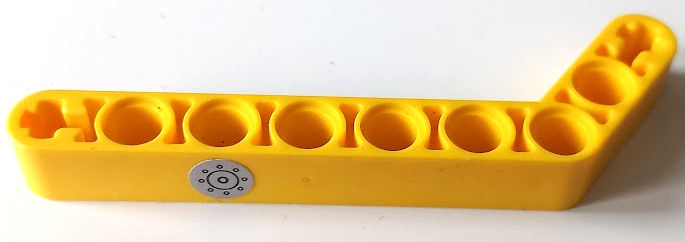 Lego Technic, Liftarm, Modified Bent Thick 1 x 9 (7 - 3) with Silver Fuel Filler Cap with Black Circles Pattern (Sticker) - Set 42058