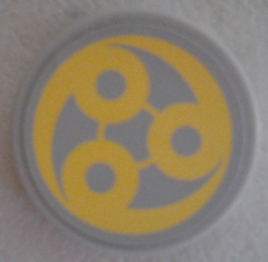Lego Tile, Round 2 x 2 with Bottom Stud Holder with Yellow Swirl SW Ado Eemon Emblem Pattern (Sticker) - Set 75042