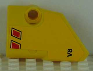 Lego Technic, Panel Fairing # 1 Small Smooth Short, Side A with 'V8' and black and Red Vent Openings Pattern (Sticker) - Set 8109 / Yellow