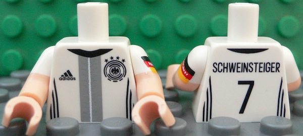 Lego Torso Soccer Shirt with Adidas Logo, 4 Stars and Eagle Front, 'SCHWEINSTEIGER 7' Back Pattern / Light Nougat Arms with Molded White Short Sleeves and Printed German Flag with 'Spielführer' Pattern / Light Nougat Hands