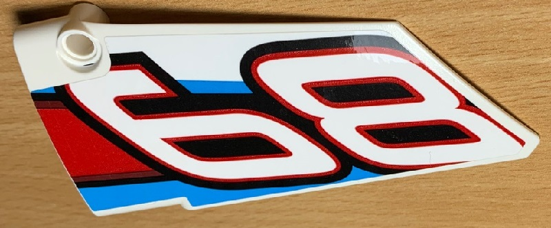Lego Technic, Panel Fairing #17 Large Smooth, Side A with '68' and Red, Black and Blue Lines Pattern (Sticker) - Set 42077 / White