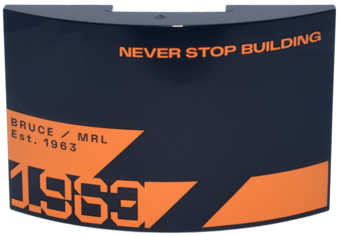 Lego Slope, Curved 6 x 4 Double with Orange 'NEVER STOP BUILDING' 'BRUCE / MRL Est. 1963' Triangles and Stylized Number 1963 Pattern / Black