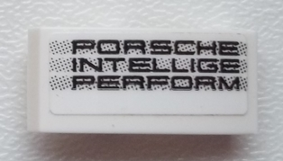 Lego Slope, Curved 2 x 1 x 2/3 with 'PORSCHE INTELLIGE PERFORM' Pattern Model Left Side (Sticker) - Set 75876