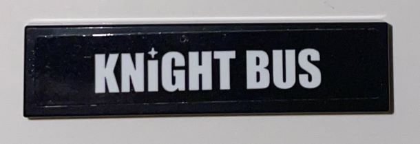 Lego Tile 1 x 4 with White 'KNIGHT BUS' Pattern (Sticker) - Set 75957 / Black