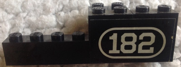 Lego Stickered Assembly 8 x 2 x 2 with White Number 182 with Border on Black Background Pattern Model Right Side (Sticker) - Set 182