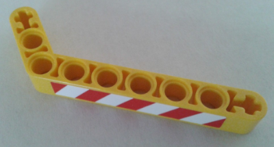 Lego Technic, Liftarm, Modified Bent Thick 1 x 9 (7 - 3) with Red and White Danger Stripes Pattern Model Left (Sticker) - Set 8053 / Yellow