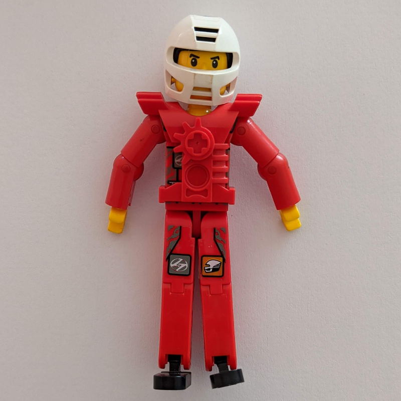 Lego Technic Figure Red Legs, Red Top with Technic Logo and Black Hair - White Helmet