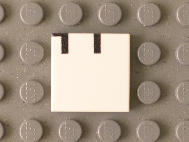 Lego Tile 2 x 2 with Black 'HT' Upper Half Pattern