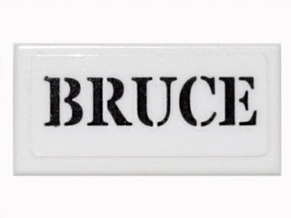 Lego Tile 1 x 2 with Black Stencil 'BRUCE' Pattern (Sticker) - Set 76052 / White