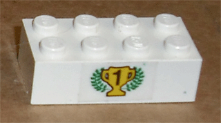 Lego Brick 2 x 4 with Black Number 1 on Yellow Trophy Cup and Laurels Pattern (Sticker) - Set 6539 / White
