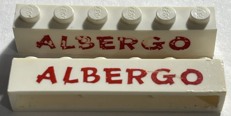Lego Brick 1 x 6 without Bottom Tubes with Cross Side Supports with Red 'ALBERGO' Comic Sans Pattern / White