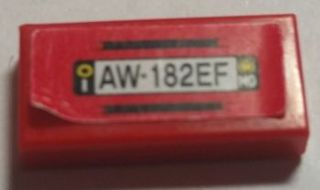 Lego Tile 1 x 2 with Black Lines and 'AW 182EF' on Red Background Pattern (Sticker) - Sets 8153 / 8155 / Red