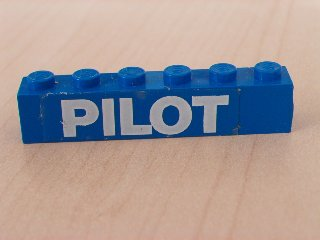 Lego Brick 1 x 6 with White 'PILOT' Text Bold Pattern (Sticker) - Set 6542 / Blue