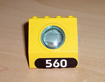 Lego Panel 4 x 3 x 3 with Trans-Light Blue Porthole with White '560' in Black Oval Pattern (Sticker) - Set 6560