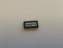 Lego Tile 1 x 2 with 'HA60110' Pattern (Sticker) - Set 60110 / Dark Bluish Gray