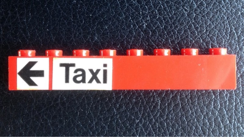 Lego Brick 1 x 8 with Black 'Taxi' and Arrow on White Background Pattern (Stickers) - Set 148
