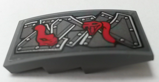 Lego Slope, Curved 4 x 2 with Metal Plates and Red Snakes Pattern Model Left Side (Sticker) - Set 70622 / Dark Bluish Gray