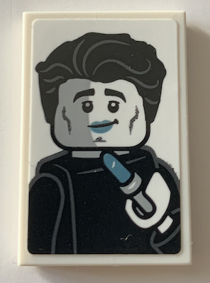 Lego Tile 2 x 3 with Black and White Minifigure, Metallic Light Blue Lipstick Pattern (Sticker) - Set 21319