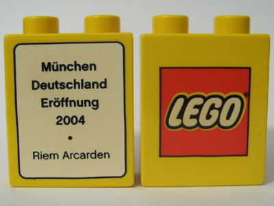 Lego Duplo, Brick 1 x 2 x 2 with The LEGO Store Munich 2004 (Riem Arcarden) Opening Pattern / Yellow