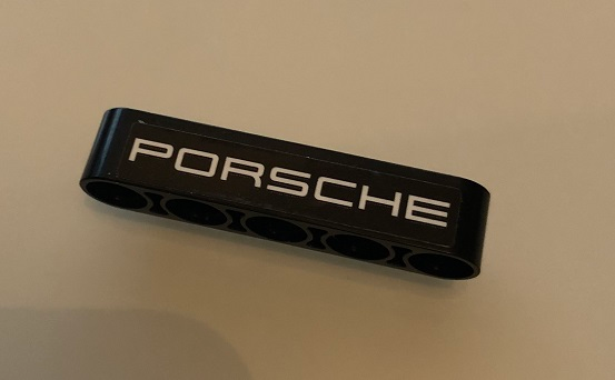 Lego Technic, Liftarm Thick 1 x 5 with White 'PORSCHE' on Black Background Pattern (Sticker) - Set 42096