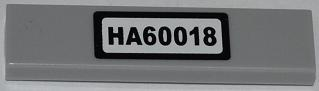 Lego Tile 1 x 4 with Black 'HA60018' on White Background Pattern (Sticker) - Set 60018 / Light Bluish Gray