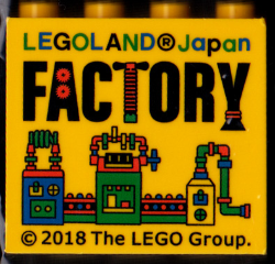 Lego Brick 2 x 4 x 3 with LEGOLAND Japan, Black 'FACTORY', and Blue, Green, and Red Machine Pattern