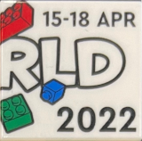 Lego Tile 2 x 2 with LEGO World Logo Right Half, '15-18 APR', 'RLD' and '2022' Pattern