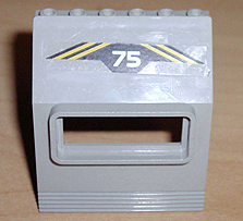 Lego Panel 3 x 6 x 6 Sloped with Window with White '75' and Yellow Diagonal Stripes on Black Background Pattern (Sticker) - Set 6575