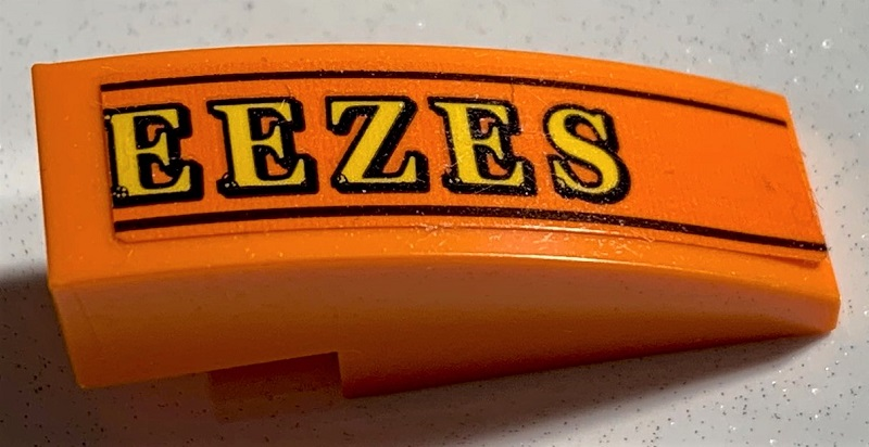 Lego Slope, Curved 3 x 1 with Yellow 'EEZES' and Black Lines Pattern (Sticker) - Set 75978
