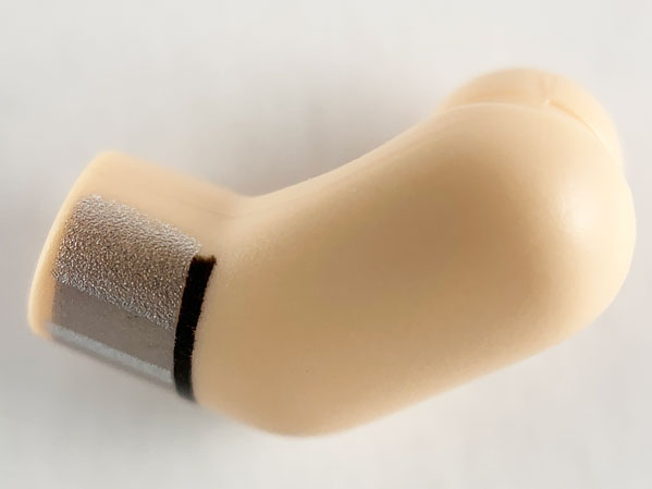 Lego Arm, Left with Silver and Light Bluish Gray Cuff Pattern / Light Nougat